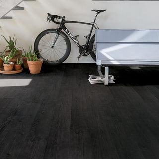 Burned planks Waterproof Laminate by Quickstep