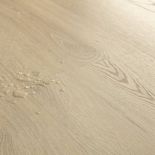 Sandy greige oak Waterproof Laminate by Quickstep