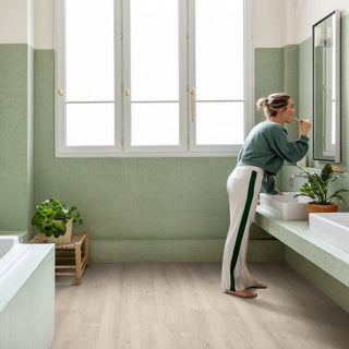 Saw cut oak beige Waterproof Laminate by Quickstep