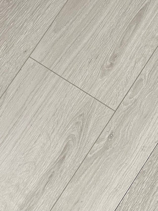 Snow Creek Water Resistant Laminate by Oasis Wood Flooring Inc.